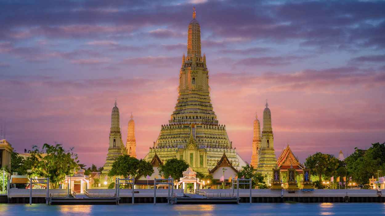 Wat Arun across the Chao Phraya River at sunset